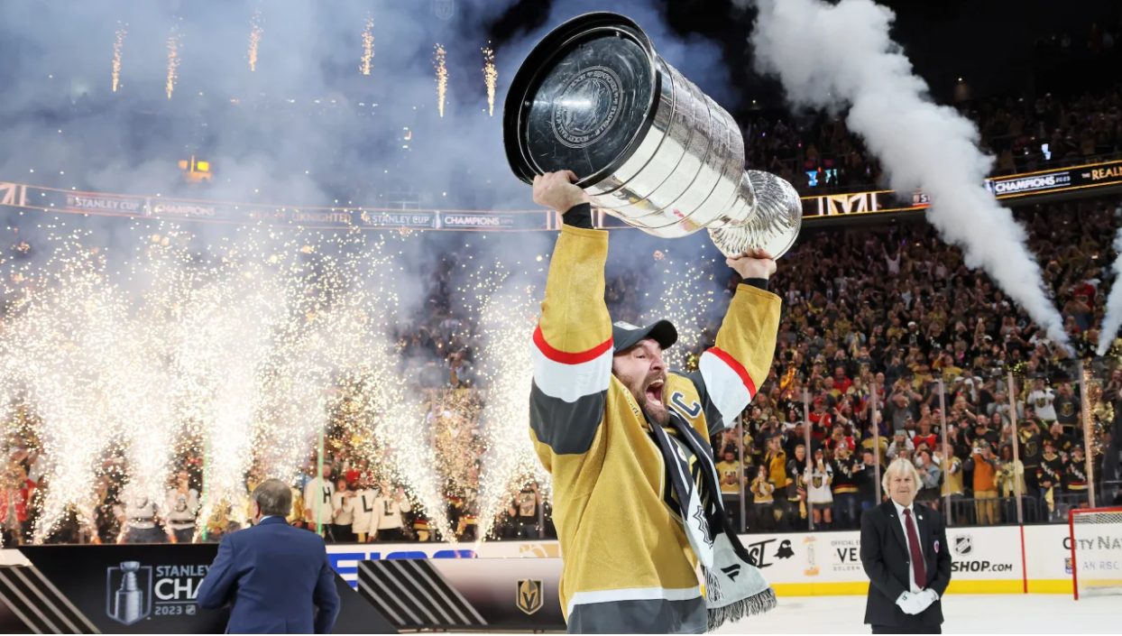 Mark Stone of the Vegas Golden Knights hoists the Stanley Cup after defeating the Florida Panthers to win the championship in Game Five of the 2023 Stanley Cup Final at T-Mobile Arena on June 13 in Las Vegas, Nevada.